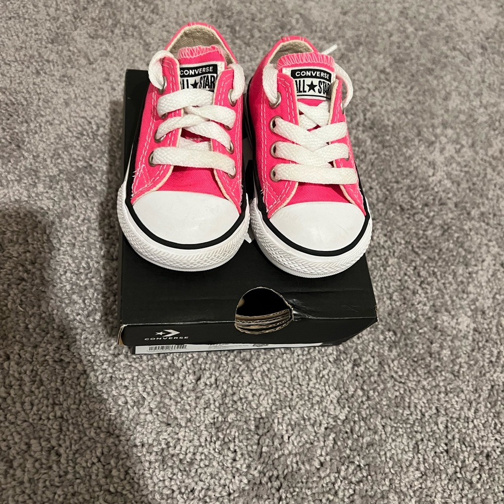 Pink and white sneakers